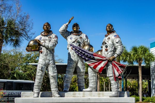 A detailed statue pays tribute to the courage of those who ventured into space.