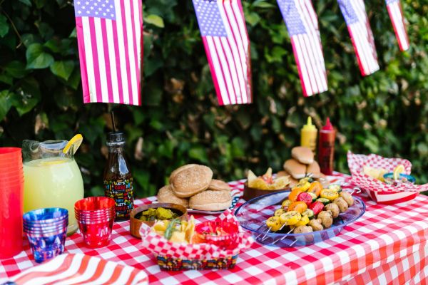 Bright flags and tasty bites make this party table a great spot to gather with friends.