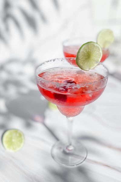 A splash of bright red with a twist of lime makes every sip feel like summer.