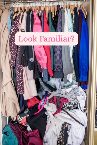 Overly cluttered clothes closet that needs to be cleaned
