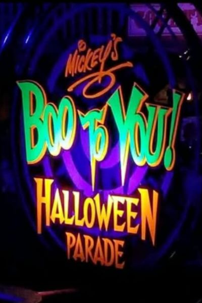 Mickey’s Boo-To-You Halloween Parade sign glowing in colorful lights during Mickey’s Not-So-Scary Halloween Party at Magic Kingdom.